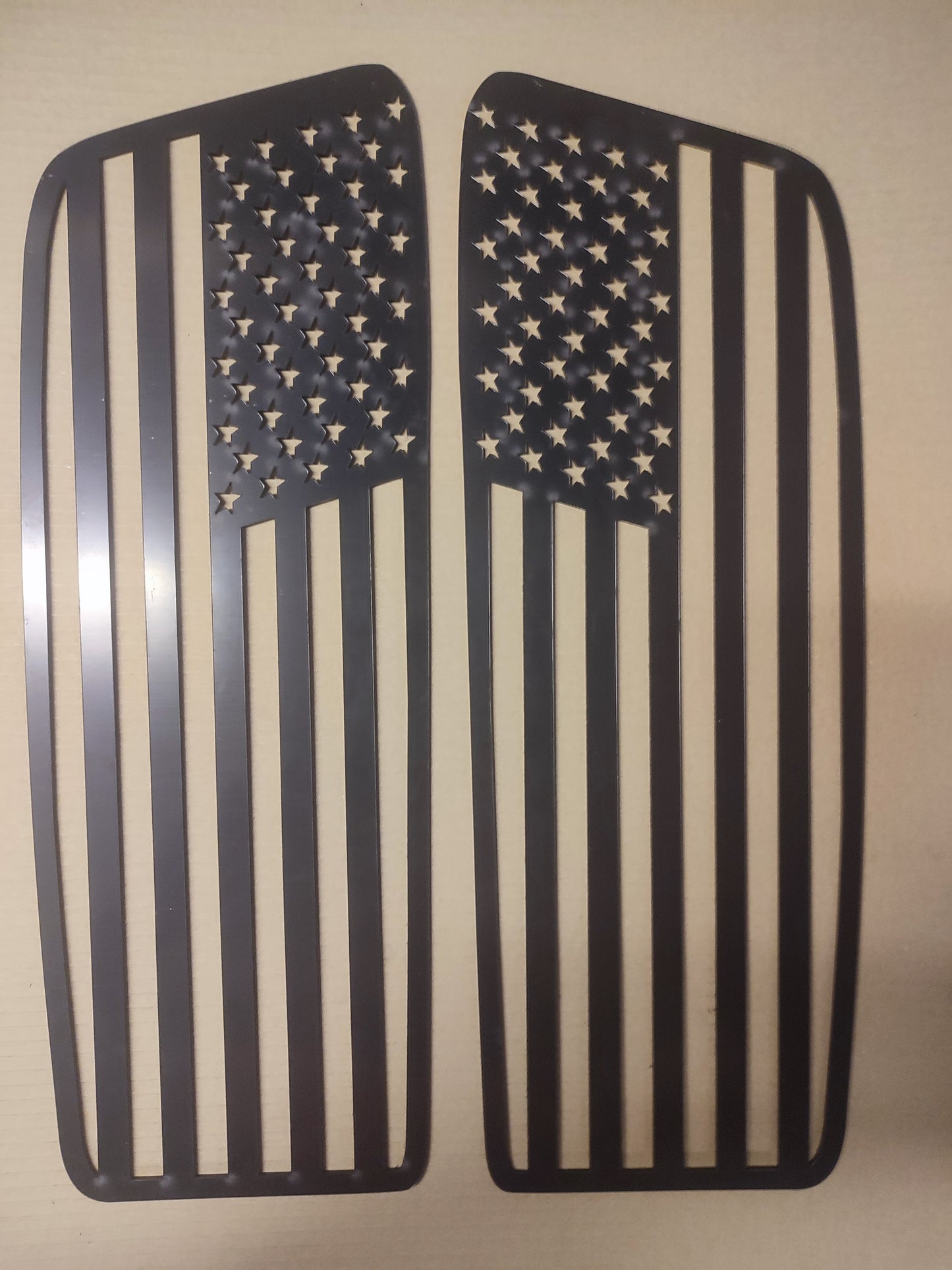 Two American flags on a beige background